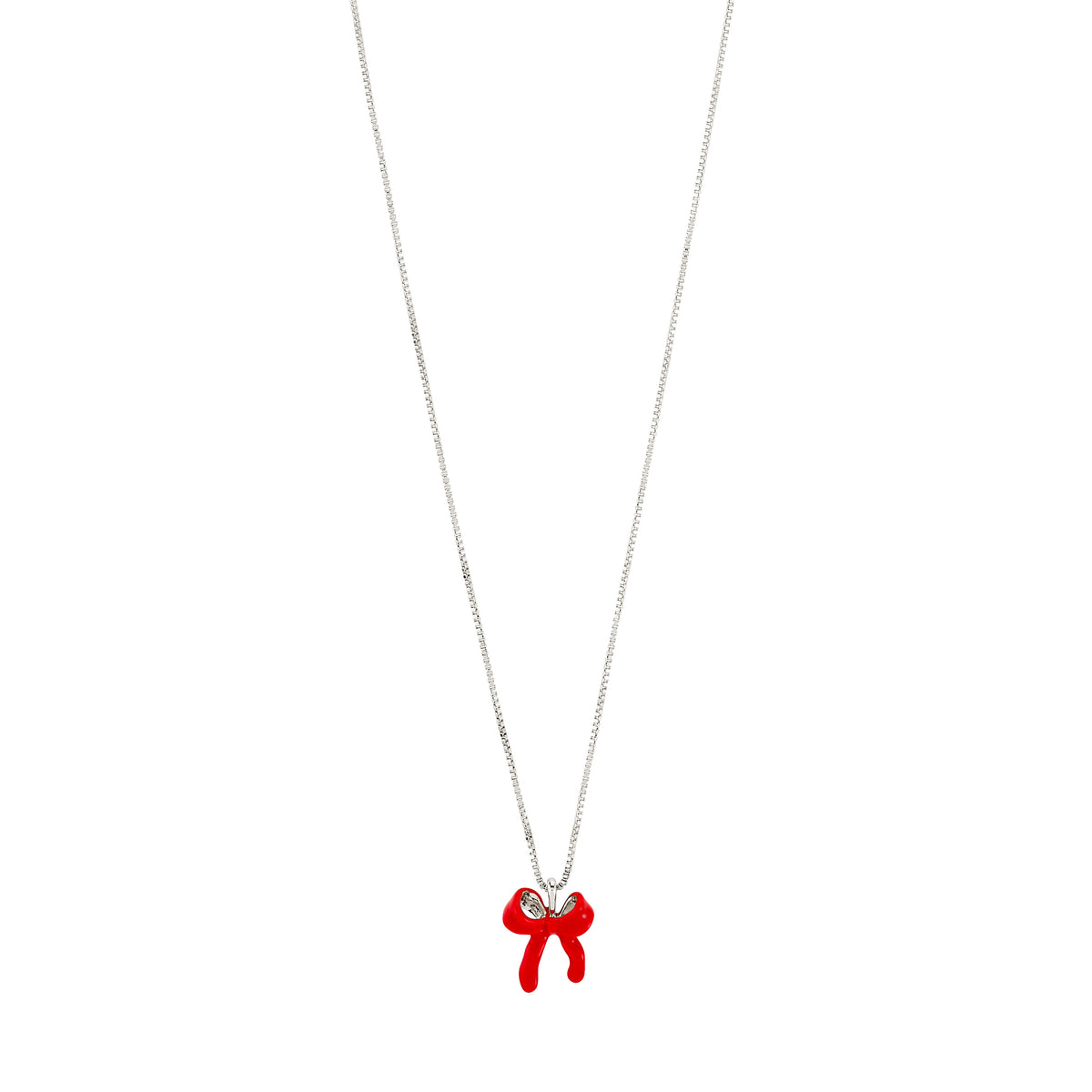 SIGRUN necklace features a silver-plated chain with a playful red enamel bow pendant, offering adjustable length for versatile styling. Crafted from 97% recycled materials.
