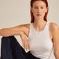 EFIA silver-plated huggie hoop earrings with engraved starry details, worn by a red-haired woman in a white tank top, showcasing elegance and style.