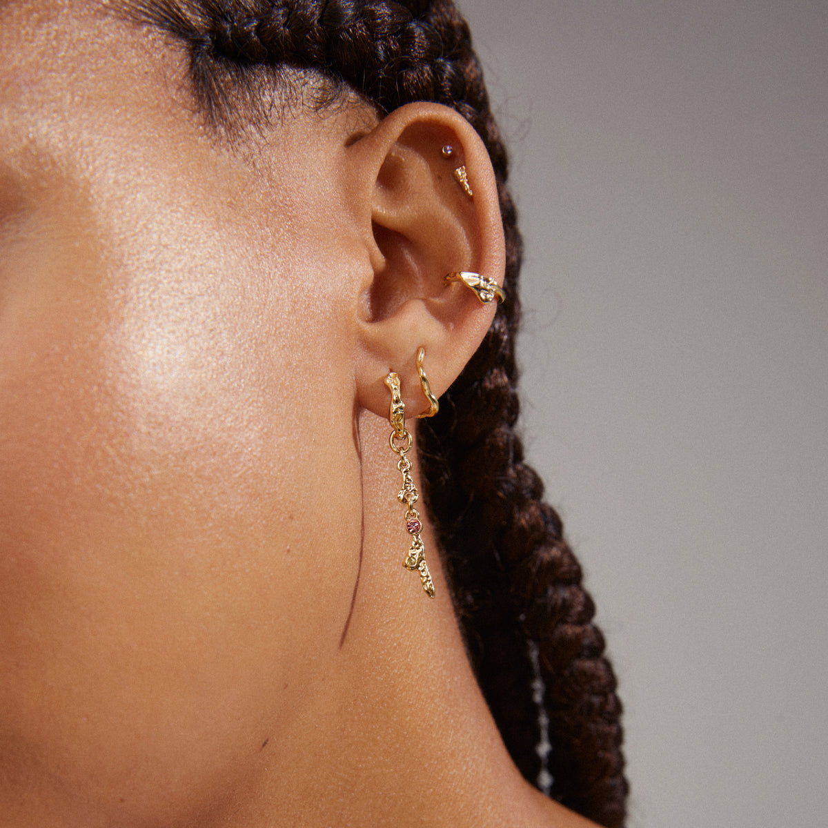 IRENE earrings & cuff 5-in-1 set gold-plated, showcasing asymmetrical designs with ear studs, cuffs, and hoops, perfect for creating a trendy, stacked ear look.