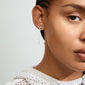 KORA moon chain earrings, silver-plated with sparkling crystals, displayed on a woman. The stylish design reflects Pilgrim's blend of timeless and trendy.