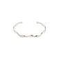 Silver-plated AIKO bracelet with a wavy, open-ended design, crafted from recycled materials, perfect for minimalist or stacked styles. Inner circumference of 17 cm.