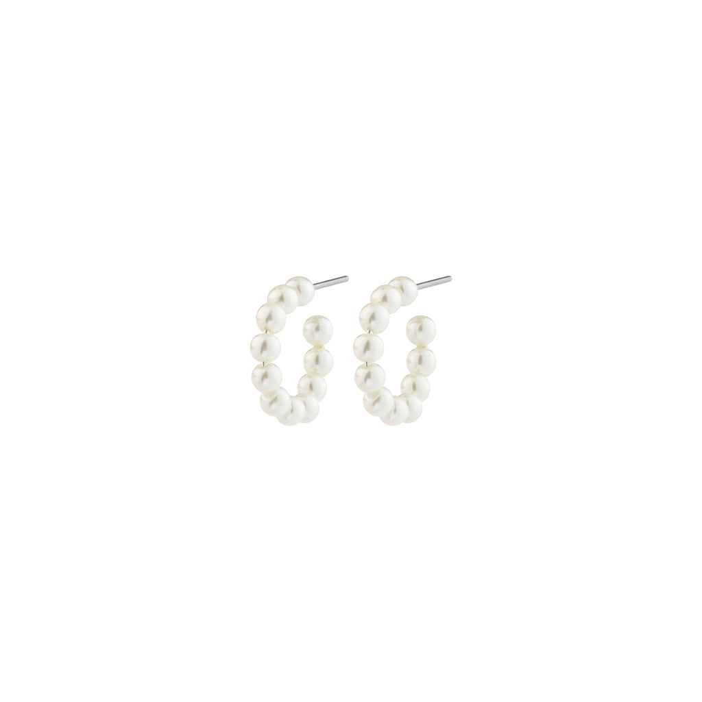 JANNI pearl hoops: Small semi-circular earrings with white pearls on wire, featuring straight posts. A stylish, recycled twist on classic pearl designs.