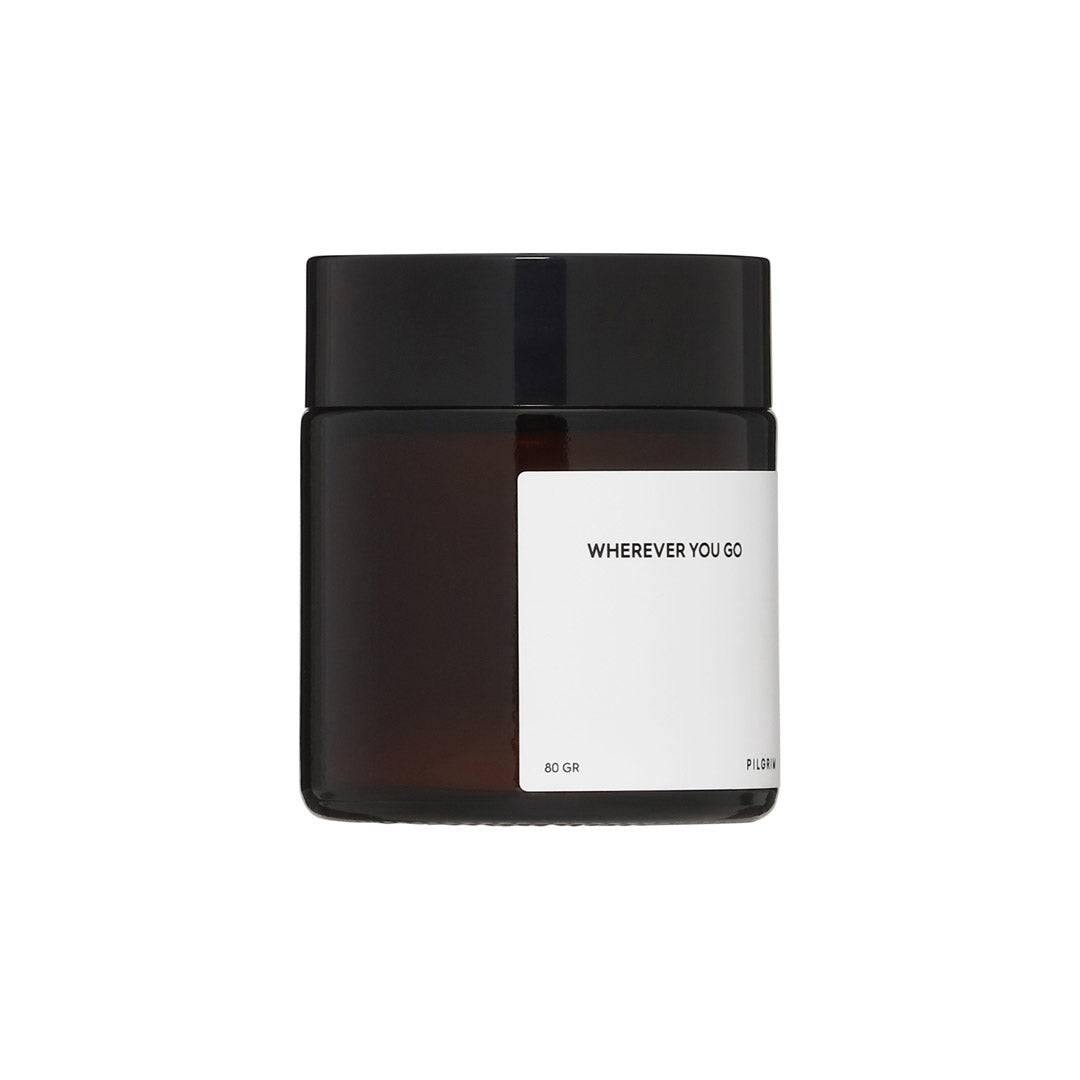 PILGRIM Scented candle in brown with sandalwood fragrance, crafted from sustainable rapeseed wax, features a cotton wick for a clean burn.
