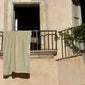 Beach Towel, 100 x 150 cm, beige with Pilgrim logo, offers a soft, luxurious touch, perfect for sunbathing or post-swim relaxation.