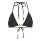 Black Pilgrim bikini in XS/S with triangle top, chunky beads, and high-cut bottoms featuring side ties, exuding boho chic and summer style.
