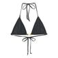Black bikini with triangle top featuring white beads and halter tie, high-cut bottoms with side ties, and decorative beaded straps. Size M/L.
