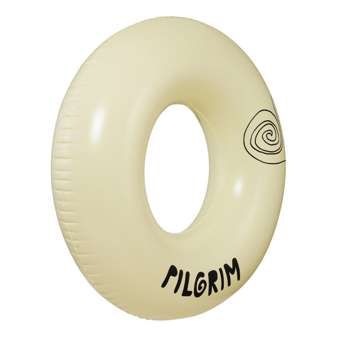Offwhite swim ring, 120 cm, featuring a sleek black Pilgrim logo, perfect for lounging poolside or at the beach, embodying Scandinavian style and summer vibes.