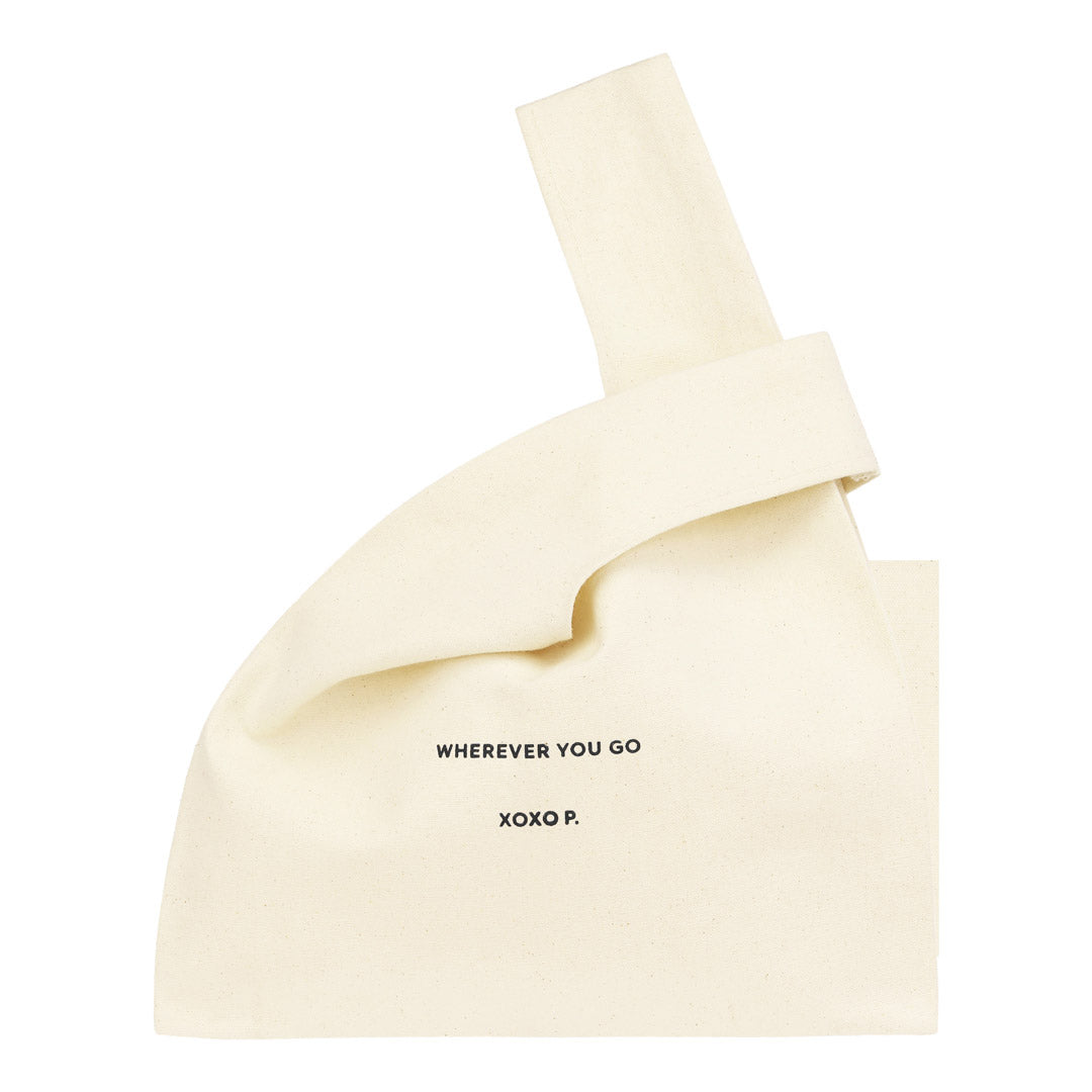 Small Fashion canvas tote-bag, off-white with black text, featuring woven straps for a stylish, minimalist look. Perfect for carrying essentials on the go.