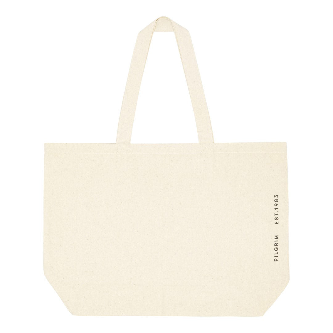 Large Fashion canvas tote-bag, off-white, featuring a sturdy design with a bold black signature print, ideal for carrying essentials in style.