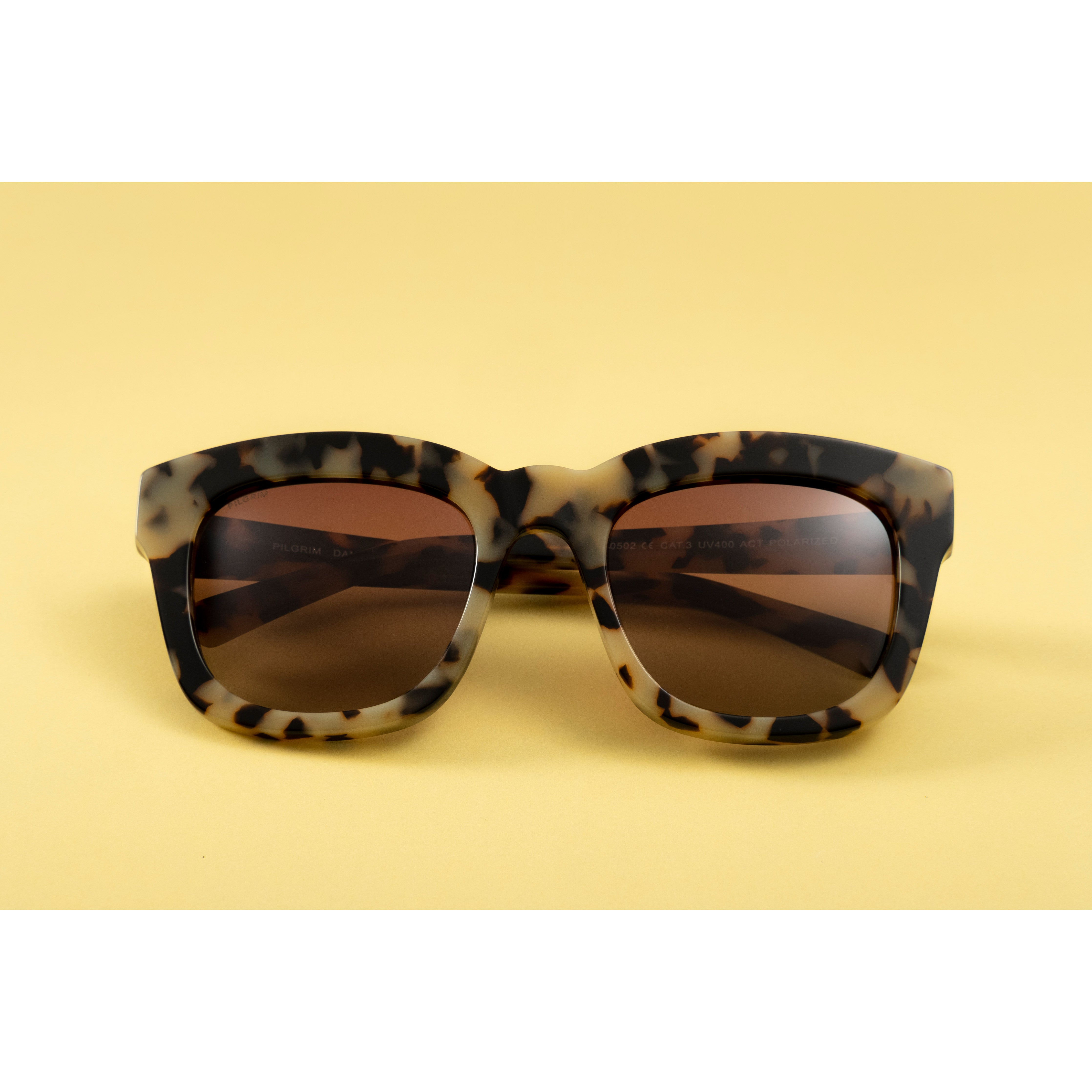 Dael sunglasses with chunky butterfly frames, offering UVA/UVB protection, perfect for adding mystery and coolness to your style.