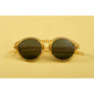 VASILIA sunglasses crystal brown with a transparent frame and dark lenses, offering a classic yet trendy look. Ideal for casual confidence, with UVA/UVB protection.