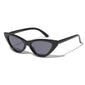 JOSELINE cat-eye sunglasses black, featuring a sleek, pointed frame with gray lenses, embody a retro-inspired, trendy design with UV protection.