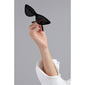 Hand holding JOSELINE cat-eye sunglasses, showcasing their trendy, retro-inspired design with pointed, narrow frames, embodying Pilgrim's blend of timeless and trendy fashion.