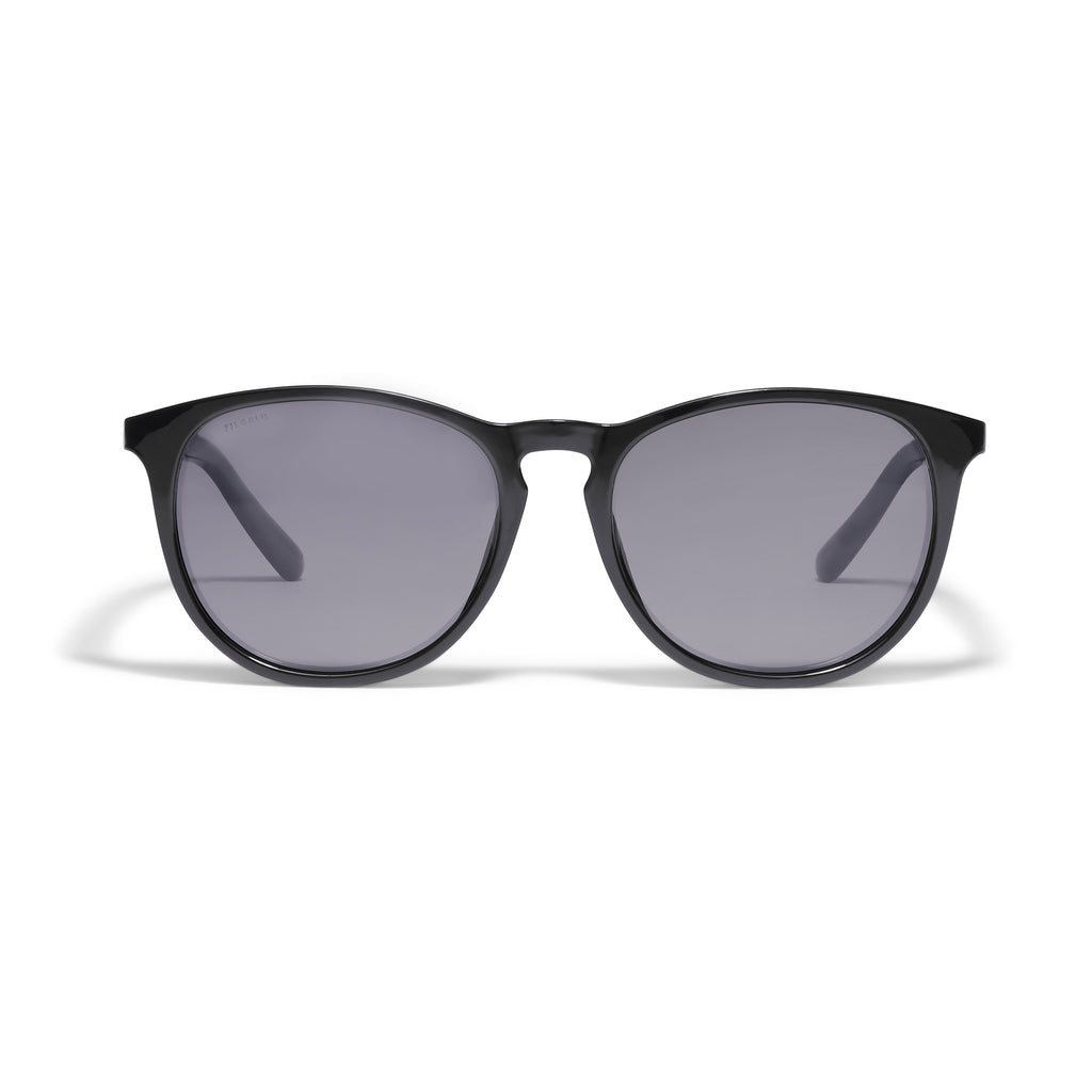 CAMILLA light frame sunglasses in black, featuring a classic design made from recycled ocean plastic, offering a trendy, lightweight feel with UVA/UVB protection.