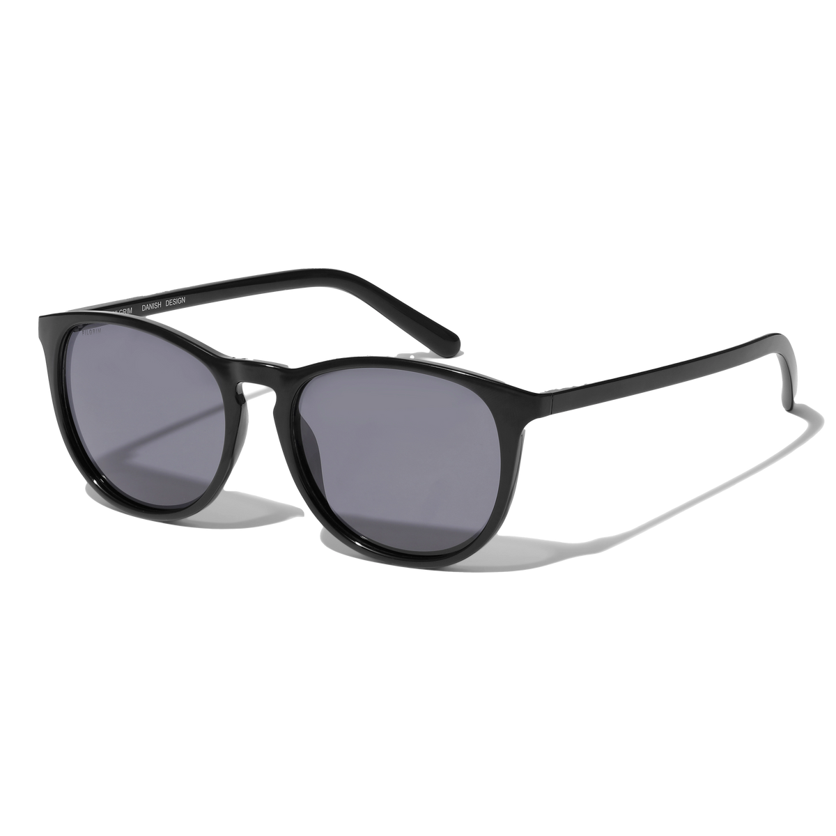 CAMILLA light frame sunglasses feature a classic design with a dark frame and smoky lenses, crafted from 75% recycled ocean plastic, offering UVA/UVB protection.