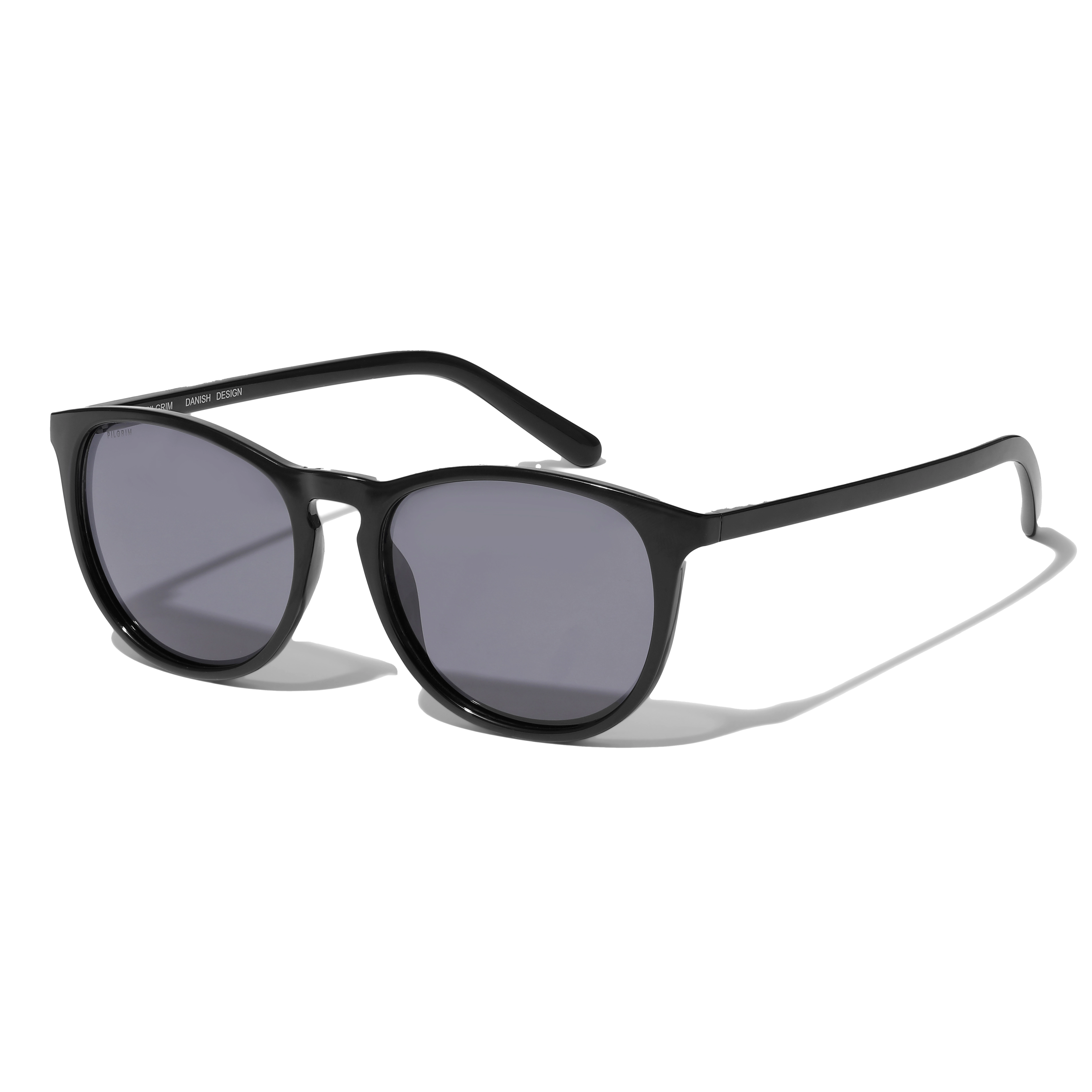 CAMILLA light frame sunglasses feature a classic design with a dark frame and smoky lenses, crafted from 75% recycled ocean plastic, offering UVA/UVB protection.