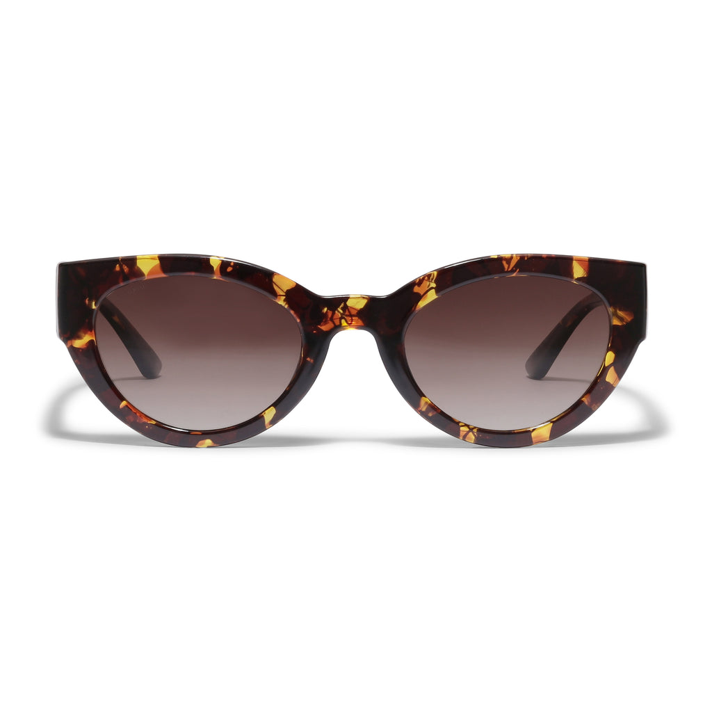 JUNA cat-eye sunglasses in tortoise brown, showcasing a retro-inspired design with a sleek frame and graduated lenses, embodying Pilgrim's blend of timeless and trendy style.