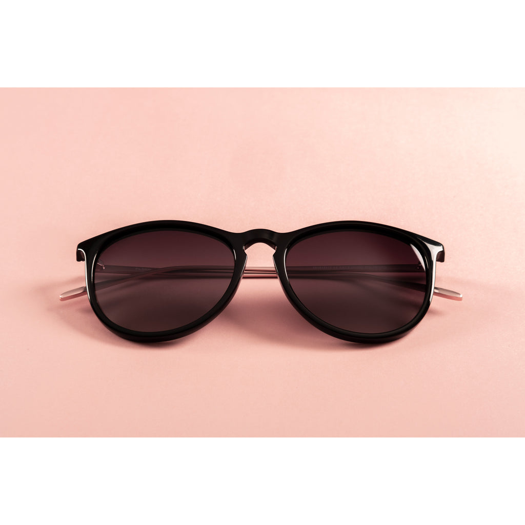 VANILLE sunglasses featuring stylish metal temples and soft rounded lenses with thin black rims, perfect for a trendy and classic look.