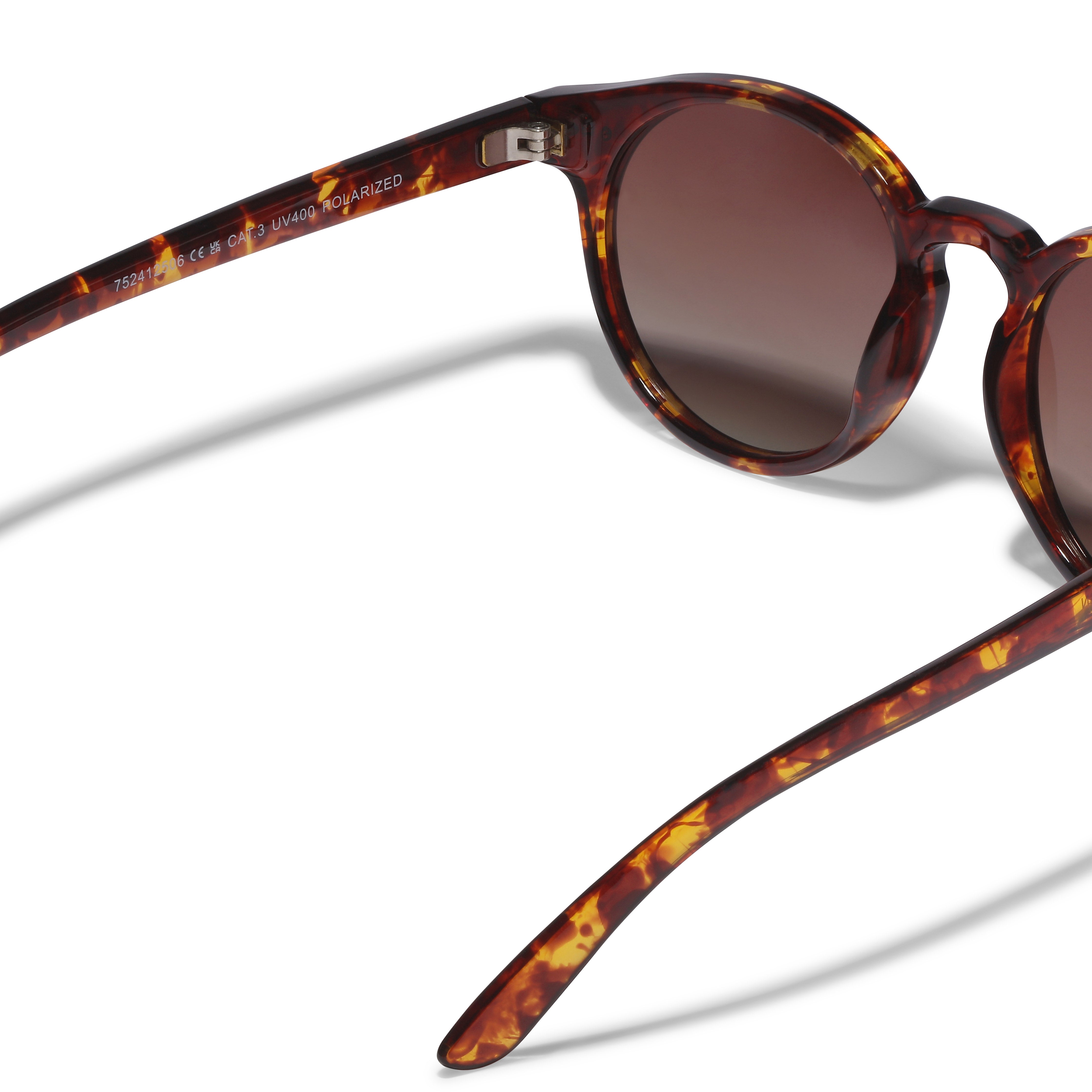 KYRIE sunglasses with tortoise-brown frame and gold accents, featuring brown lenses. Perfect for summer outfits, offering UVA/UVB protection from Pilgrim.