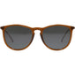 Close-up of VANILLE sunglasses in dark brown with gold accents, featuring slim metal arms and transparent frames, embodying minimalist elegance and high-class style.