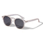 ALEJANDRA sunglasses with crystal clear frames and smoke-colored lenses, featuring a trendy, minimalist design for a stylish spring look. Includes UVA/UVB protection.
