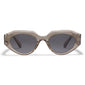 ALEXIS sunglasses in light grey with chunky transparent frame, futuristic design, and grey lenses, offering UVA/UVB protection. Perfect for trendy, fashion-forward style.