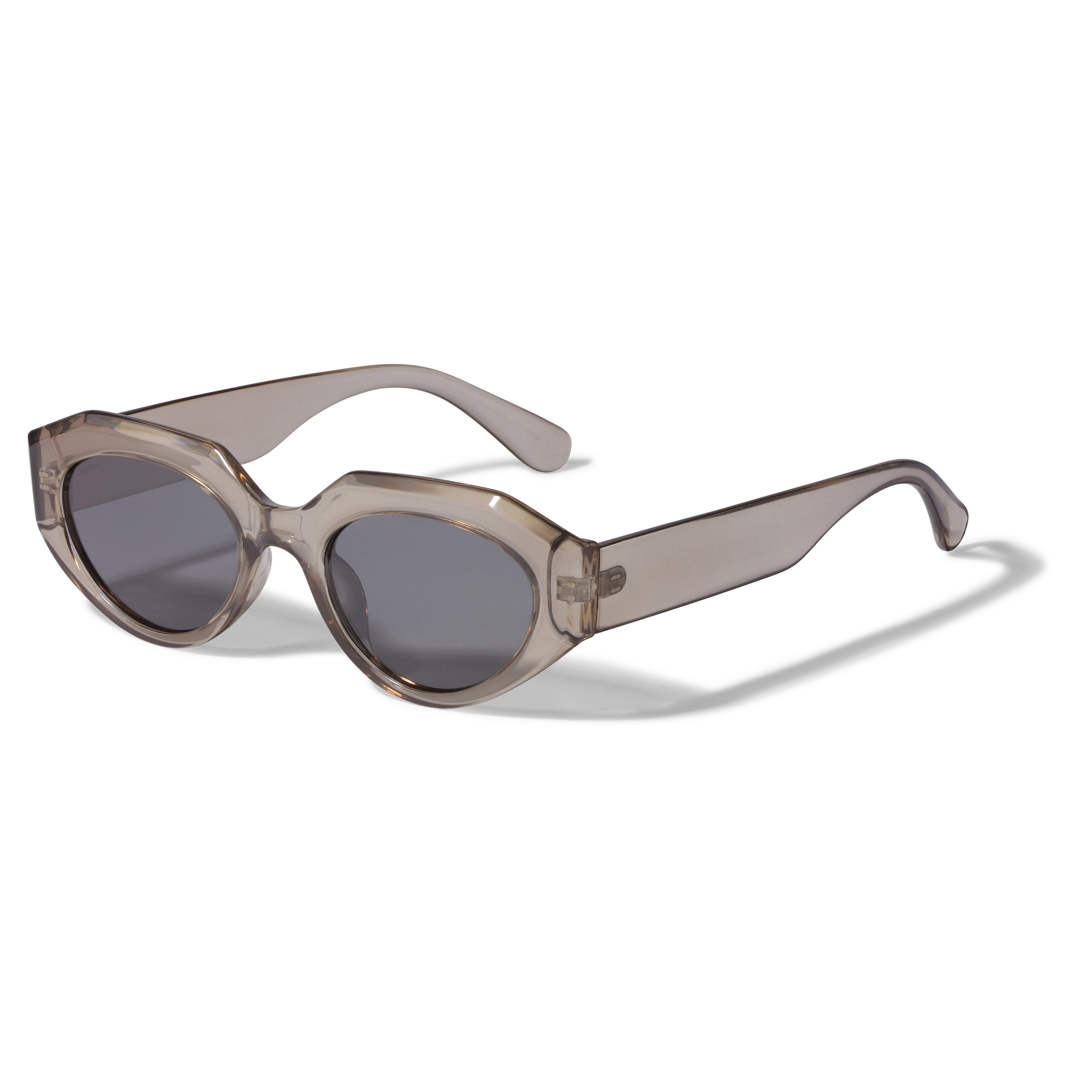 ALEXIS sunglasses light grey with a chunky, transparent frame and futuristic design, offering UVA/UVB protection, made from 75% recycled plastic by Pilgrim.