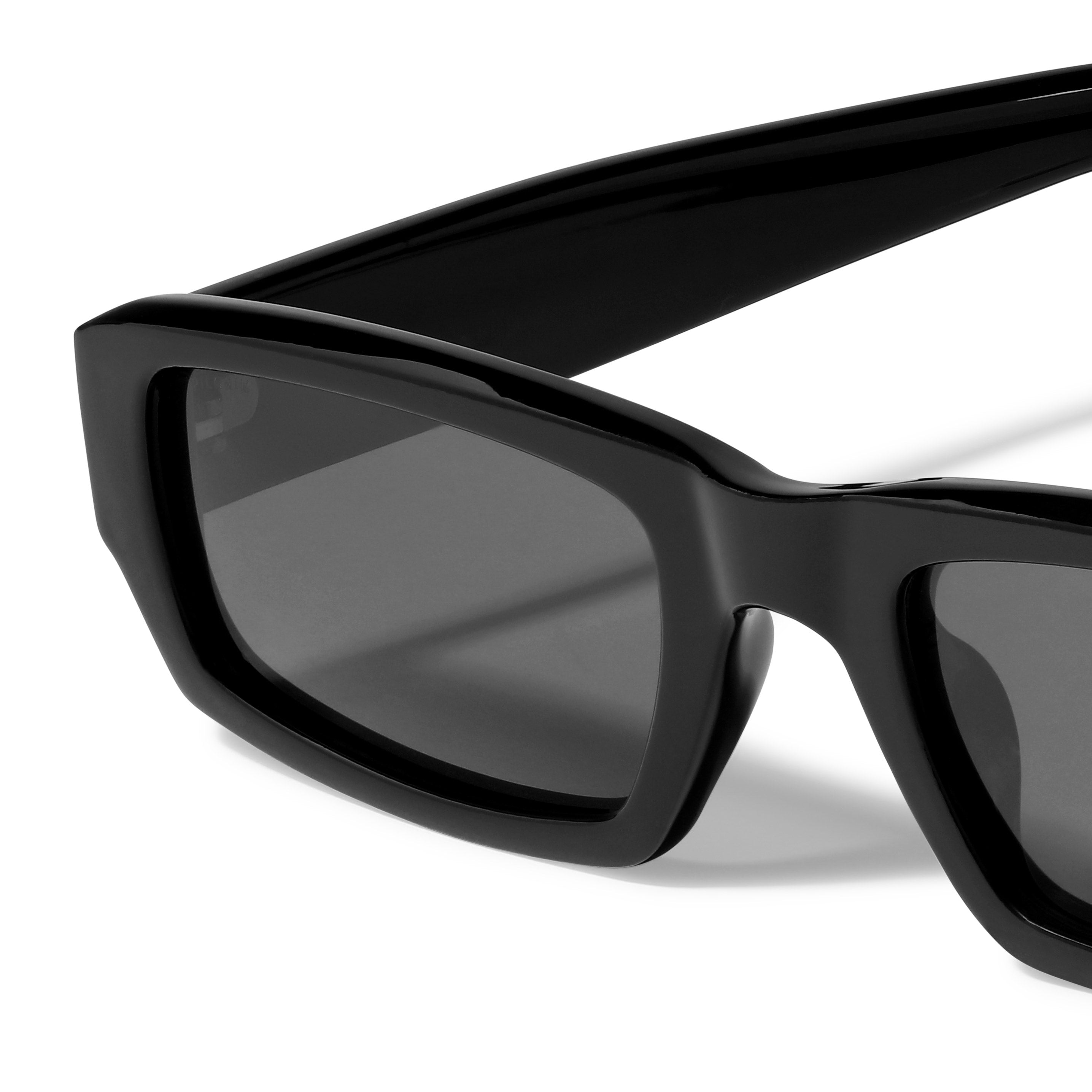 ALAYNA sunglasses black with edgy, angular frames and chunky temples, offering a unique, retro look. Made from recycled plastic, providing UVA/UVB protection.