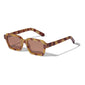 ANNALISE sunglasses, tortoise brown, with angular frames and orange lenses, perfect for stylish UV protection. Made from 75% recycled plastic by Pilgrim.