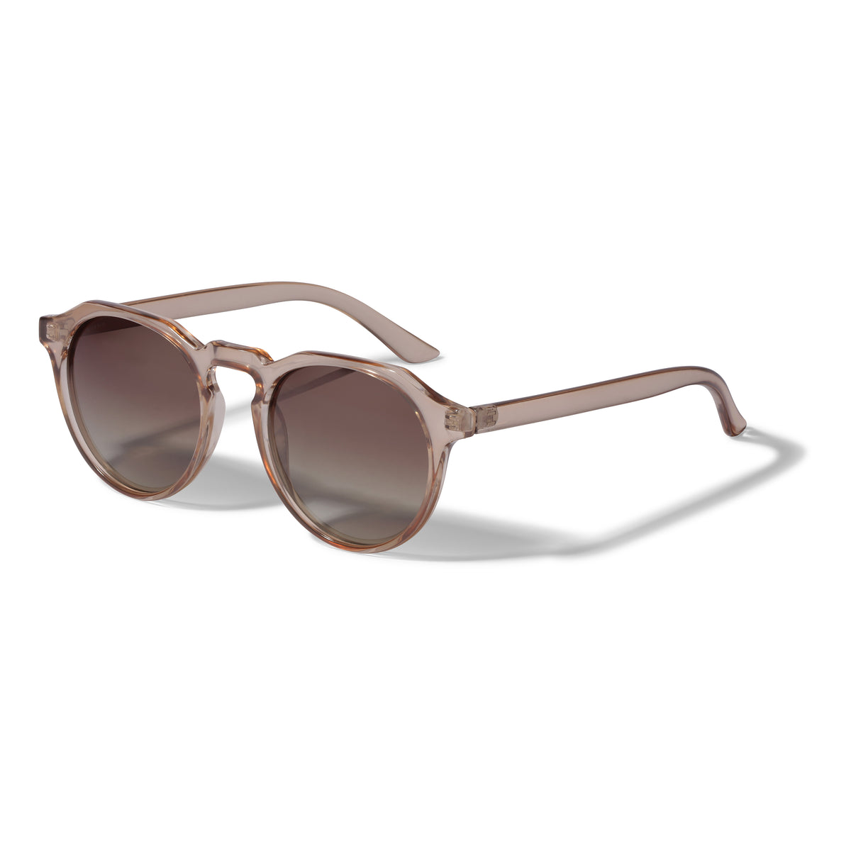 ALEJANDRA sunglasses in transparent brown, featuring a unique angular upper frame and round lenses, come with a protective fabric pouch. Offers UVA/UVB protection with UV400 lenses.