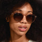 ALEJANDRA sunglasses in light brown feature a unique round design with angular upper frames, offering a trendy twist. Includes a protective fabric pouch.