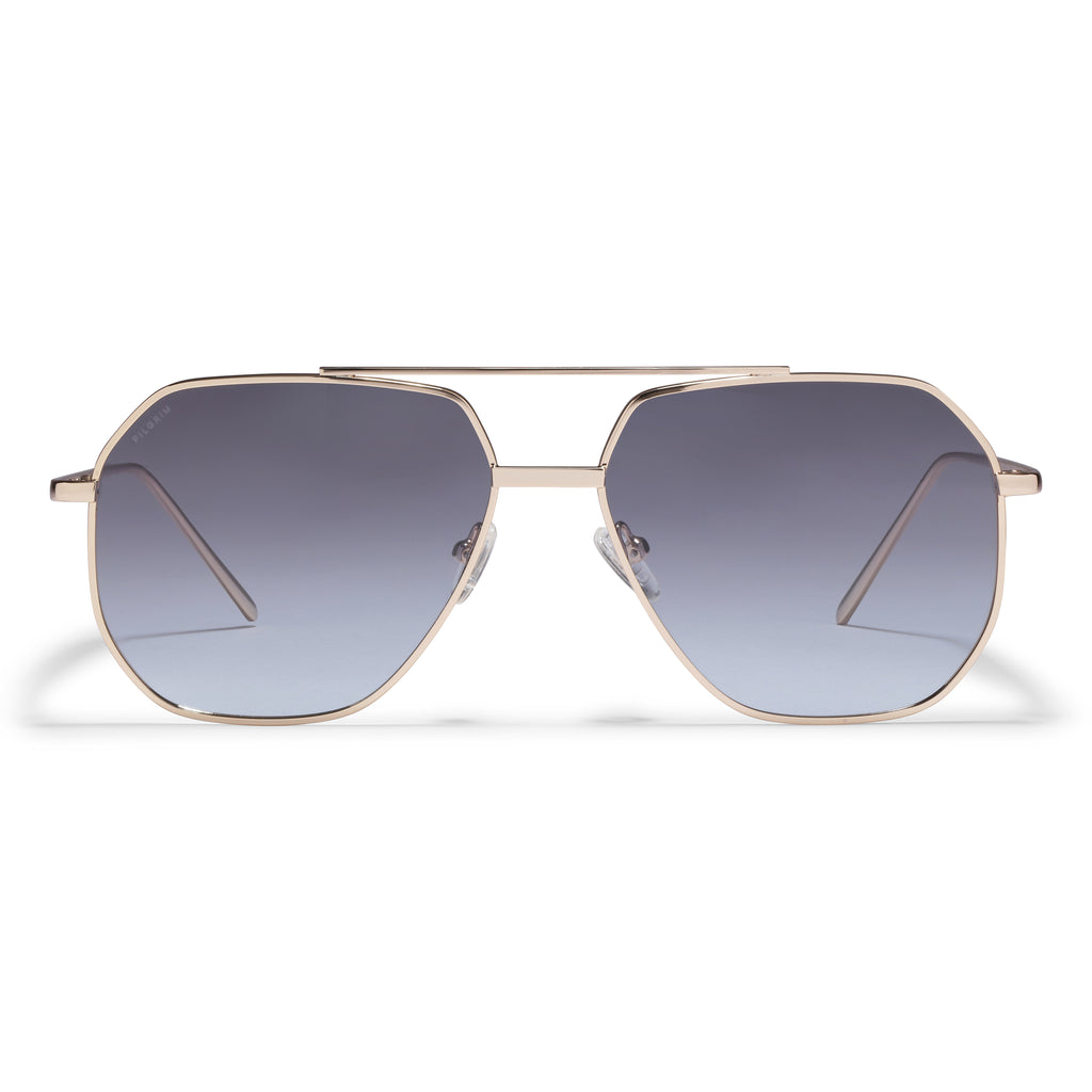 ANA sunglasses in gray and gold feature a sleek, angular Pilot-style metal frame, perfect for a cool, classy look with UVA/UVB protection.