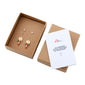 MSF earrings 2-in-1 set gold-plated featuring a pair of coin earrings with colorful beads and beaded earrings in a gift box.