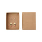 MSF earrings 2-in-1 set gold-plated, featuring gold coin and colorful beaded pendants in a box, supporting Médecins Sans Frontières.