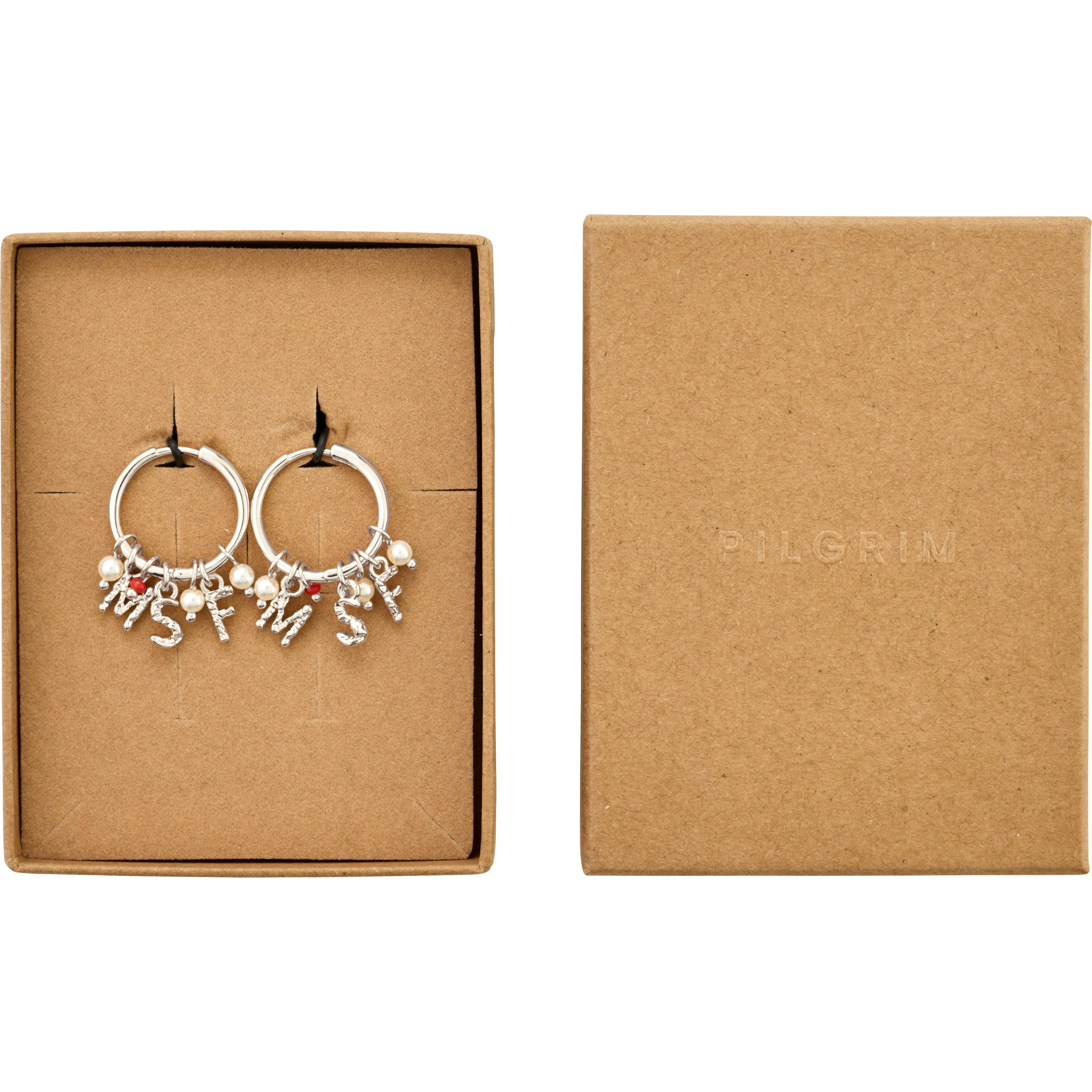 MSF earrings silver-plated in a kraft-paper box, featuring charms of pearl-style beads, red bead, and letter pendants, supporting Doctors Without Borders with recycled materials.