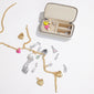 Jewellery box, Light Sand, Medium with zipper, featuring compartments for rings, earrings, and necklaces, designed in Scandinavian style for organized travel.