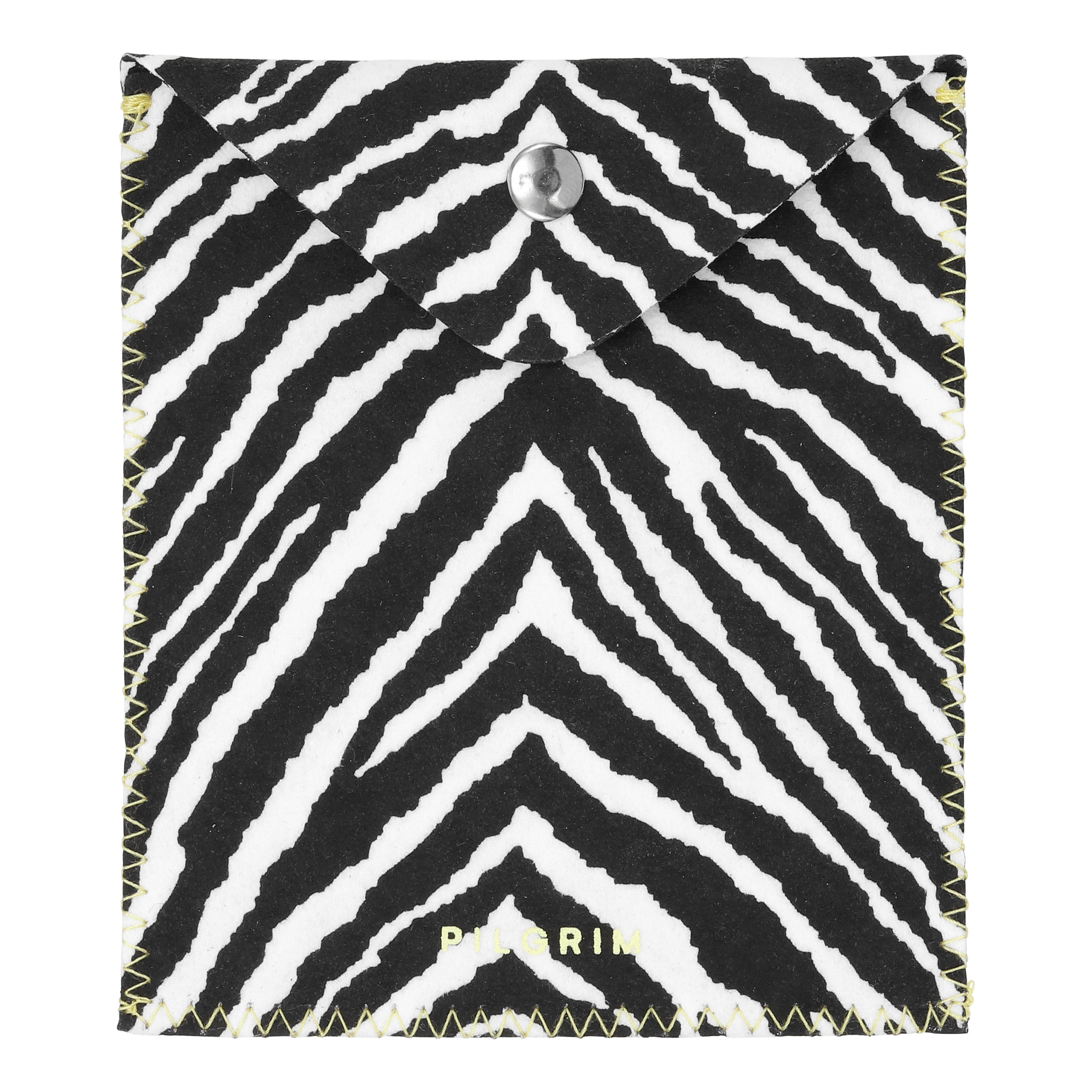 Pilgrim Mirror with Zebra Pouch: A compact mirror in a zebra-striped pouch with gold embossed branding, yellow zig-zag stitching, and a secure snap button closure.