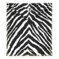 Pilgrim Mirror with Zebra Pouch: A compact mirror in a zebra-striped pouch with gold embossed branding, yellow zig-zag stitching, and a secure snap button closure.