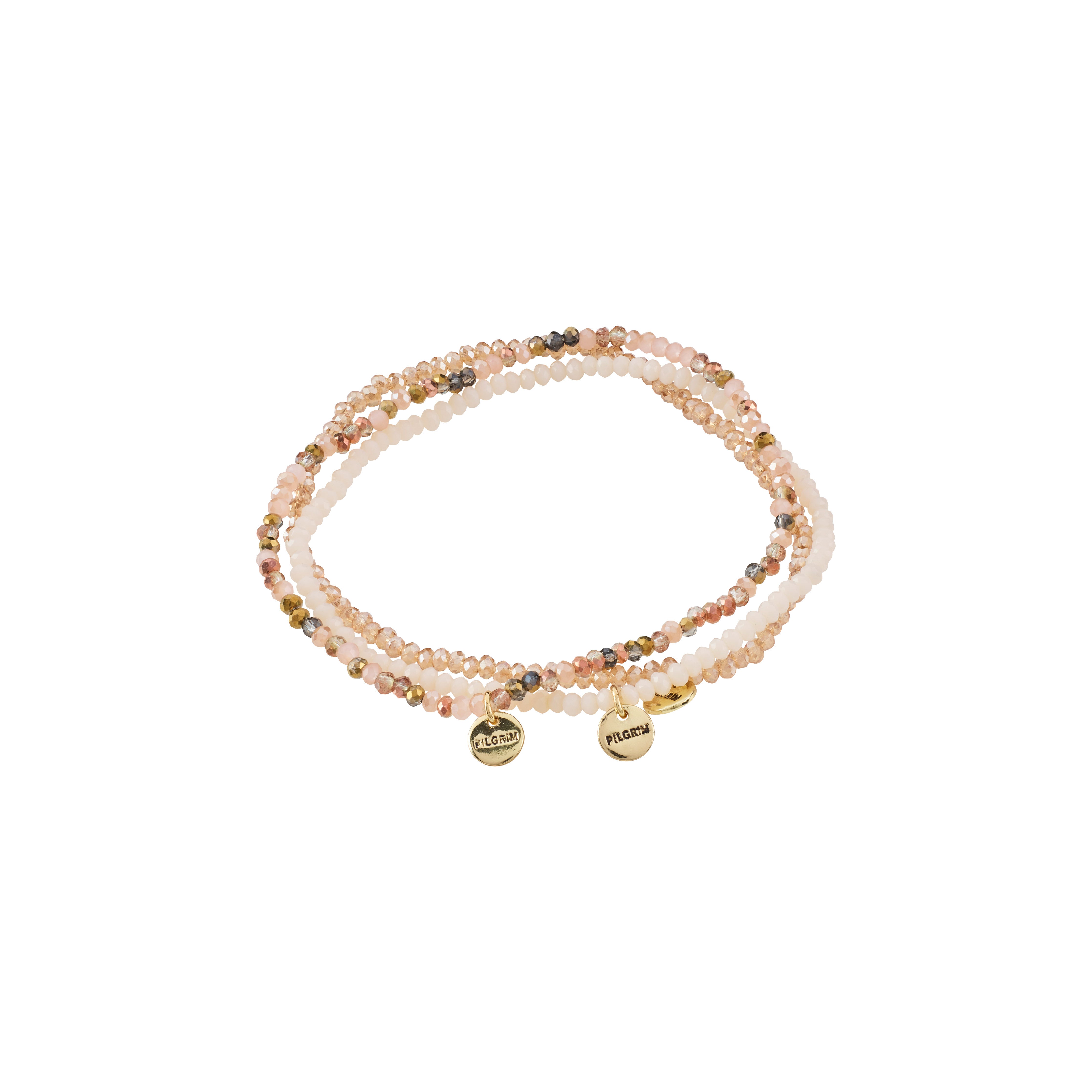 INDIGO 3-in-1 bracelet set featuring stackable, faceted glass beads in soft tones with gold-plated Pilgrim charms, strung on durable elastic for versatile styling.