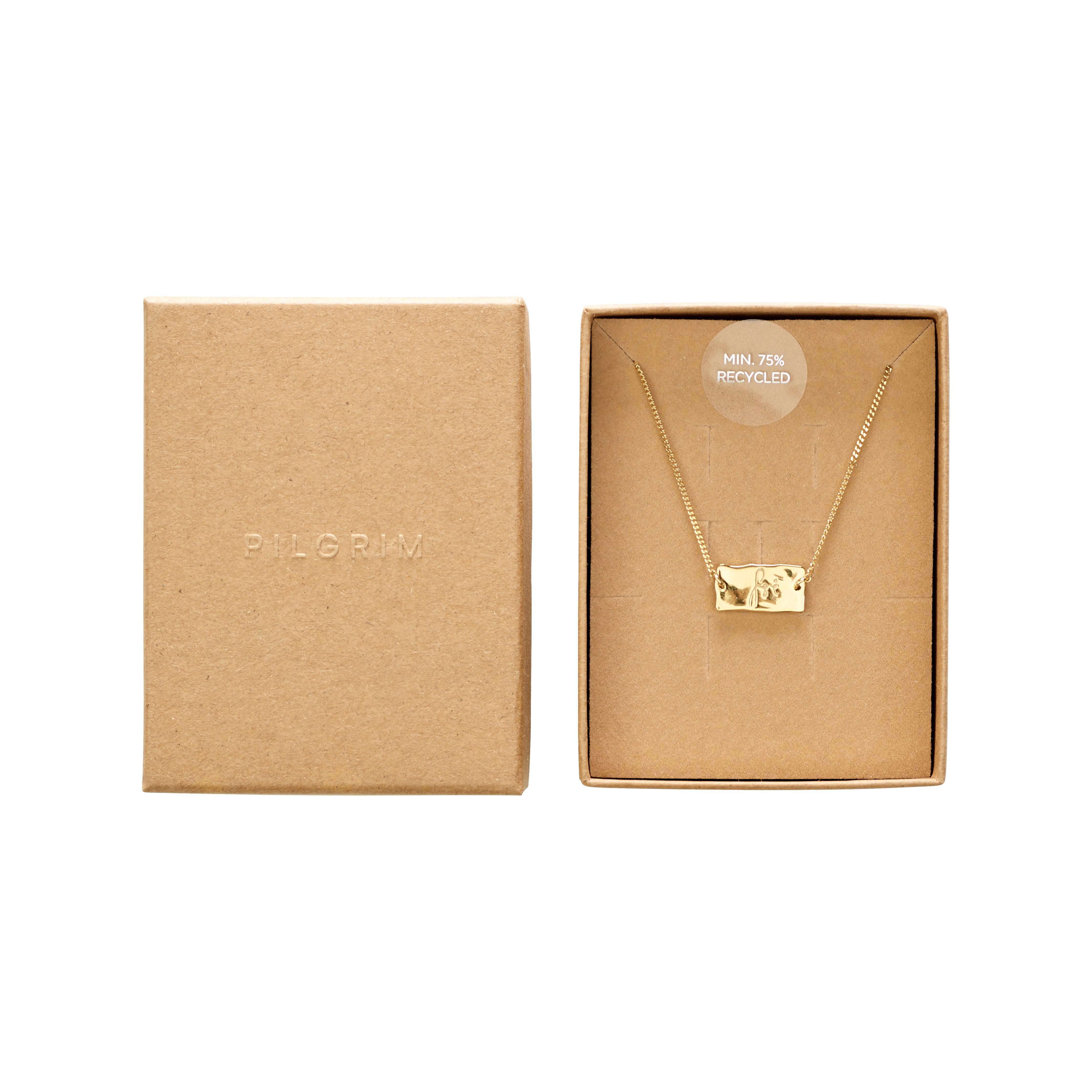 Gold-plated bracelet in a box with an engraved rectangular pendant, supporting FRI AF MISBRUG. Elegant, sleek design, reflecting light beautifully.