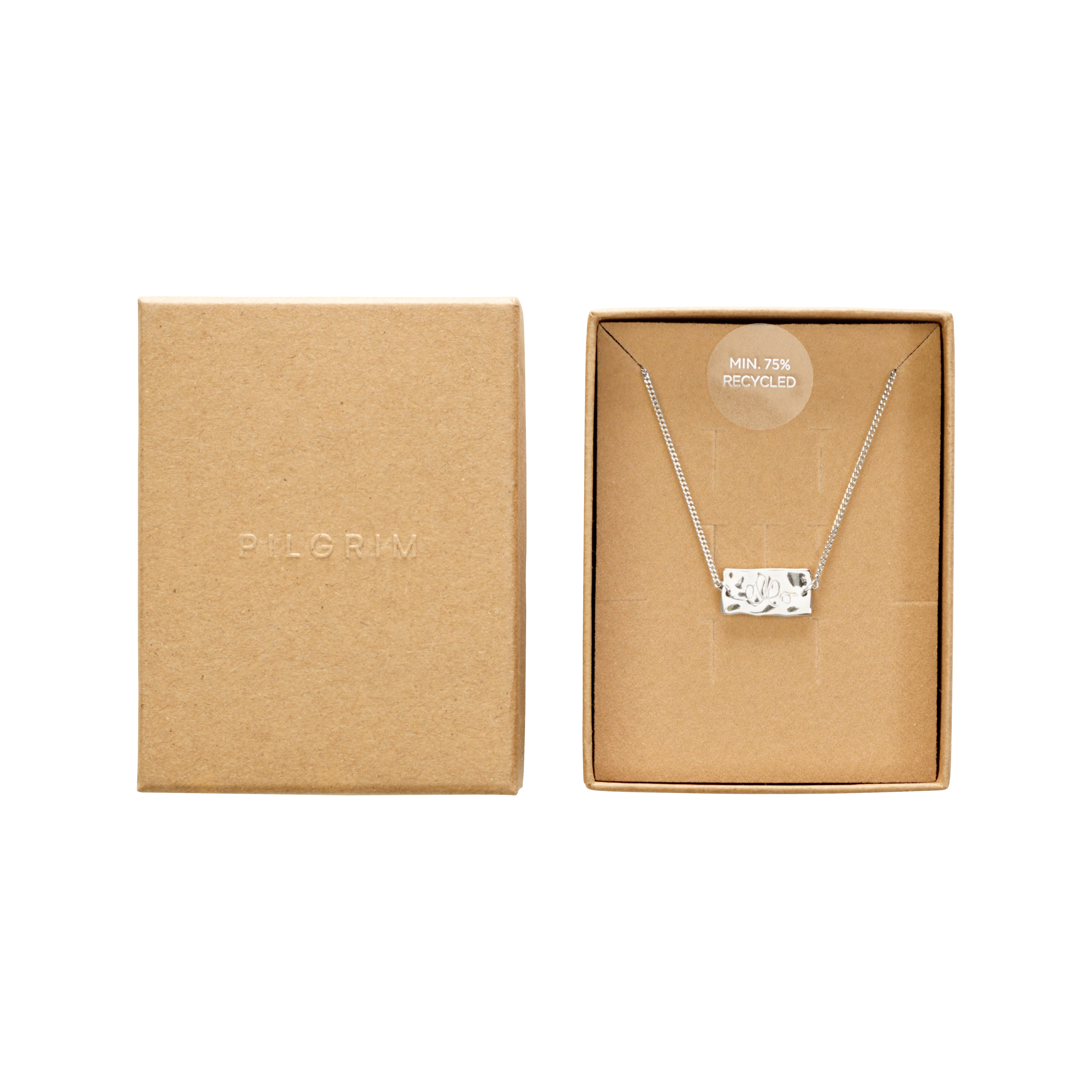 Silver-plated Fri Af Misbrug bracelet in a box, featuring a sleek chain and engraved rectangular pendant, supporting FRI AF MISBRUG's charitable cause.