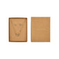 HARLAN gift set: Open kraft box with gold-plated necklace featuring interlocking crystal circles and matching stud earrings, reflecting Pilgrim's elegant, eco-friendly Scandinavian design.