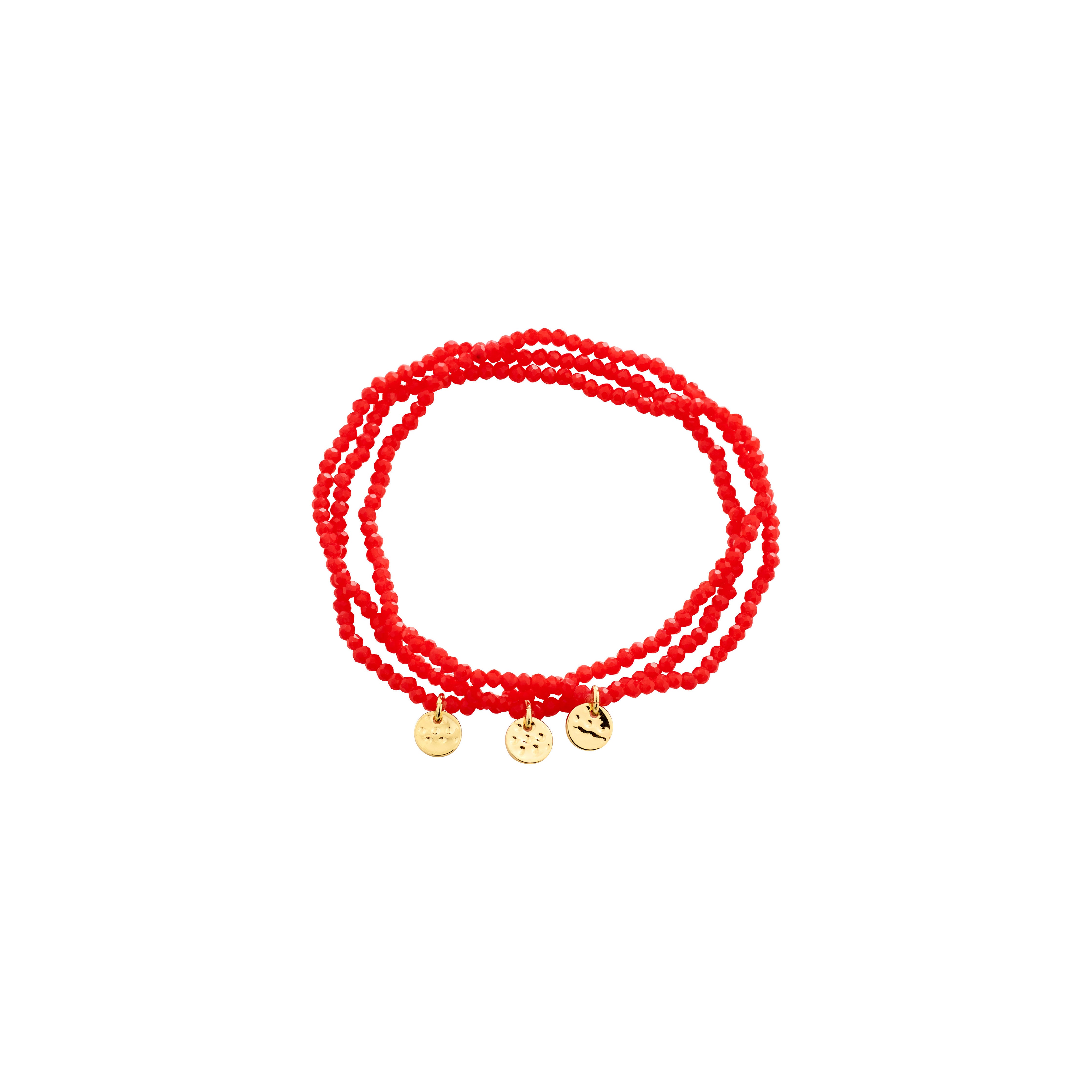 INDIGO 3-in-1 bracelet set with red faceted beads and gold-tone disc charms, offering a versatile, stylish accessory for any occasion.