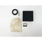 Eco-friendly gift wrap set with a luxurious black box and organic cotton bag, perfect for presenting Pilgrim jewelry like rings or bracelets.