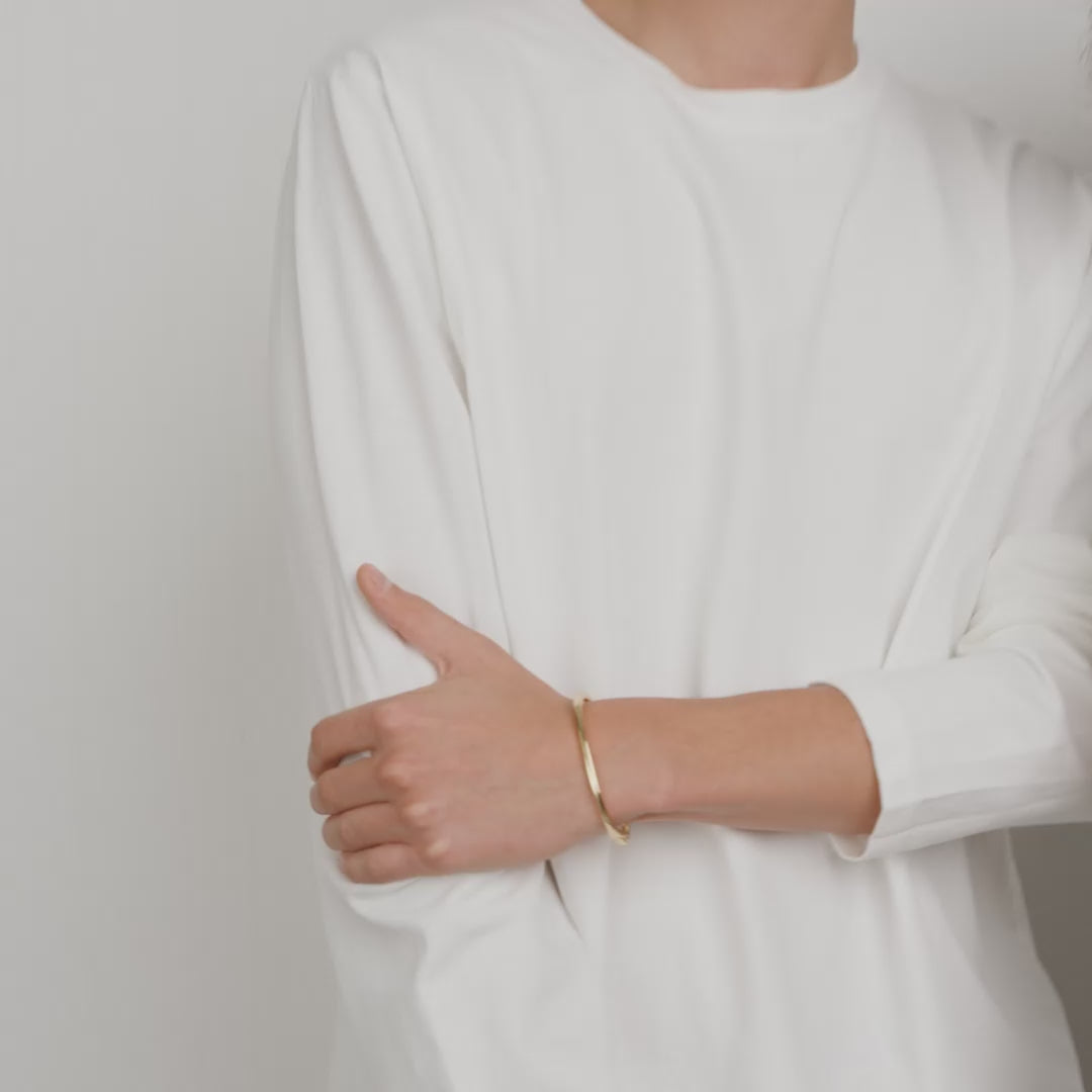 ALAIA armring guldpläterad